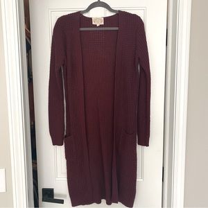 Ambiance boutique brand wine colored sweater